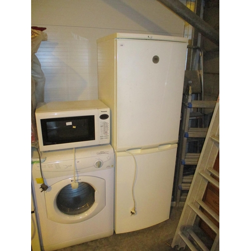 650 - Zanussi Fridge Freezer and a Panasonic Microwave