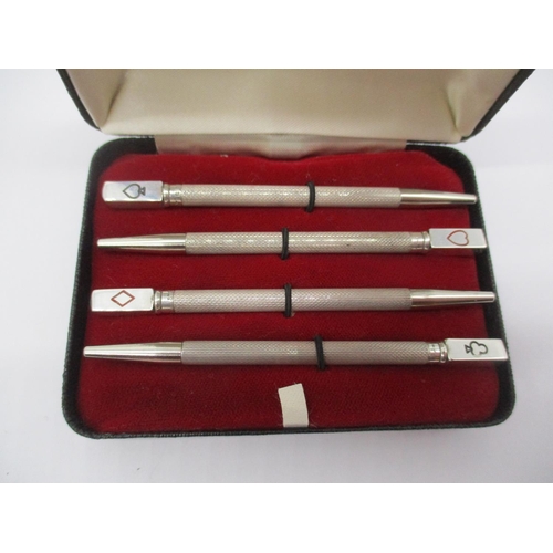 300 - Cased Set of 4 Silver Bridge Pencils with Enamelled Card Suit Symbols