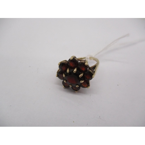 312 - 9ct Gold Garnet Set Flower Head Cluster Ring, 4.2g, Size M