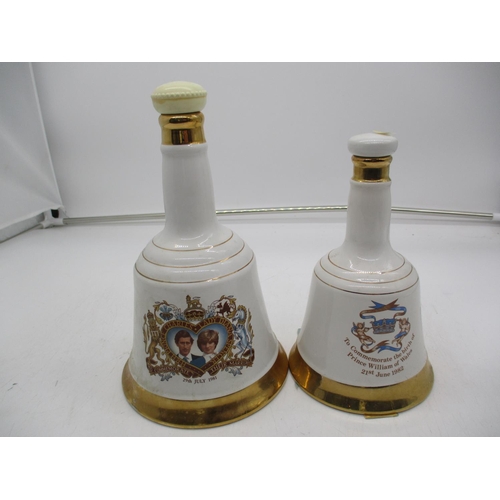 323 - Two Wade Bells Decanters, Charles and Diana and Prince William, seals broken