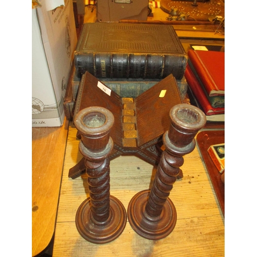 76 - Two Leather Bound Bibles, Fletchers Devotion, Koran Stand and a Pair of Candlesticks