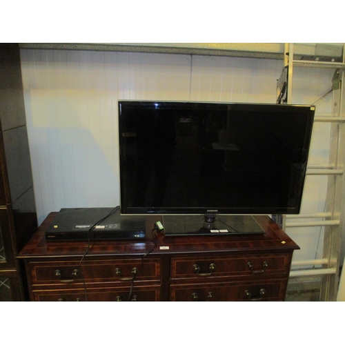 Samsung 37in TV and Sony Blue Ray, with remotes