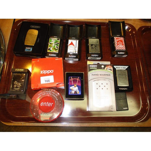 166 - Ten Zippo Lighters and a Hand Warmer