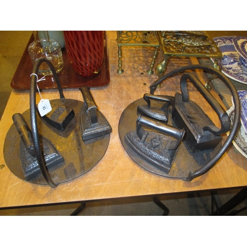 83 - Two Cast Iron Griddle Pans, 5 Irons and Iron Weight