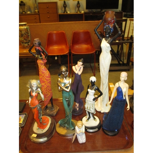 203 - Eight Figurines