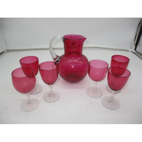 295 - Victorian Ruby Glass Water Jug and 6 Goblets