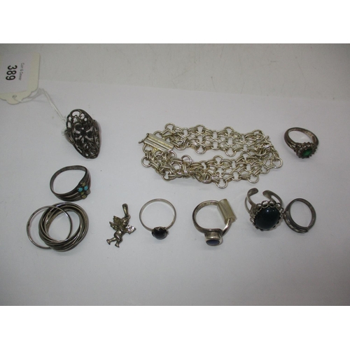 389 - Eight Rings, Bracelet and Cherub Pendant