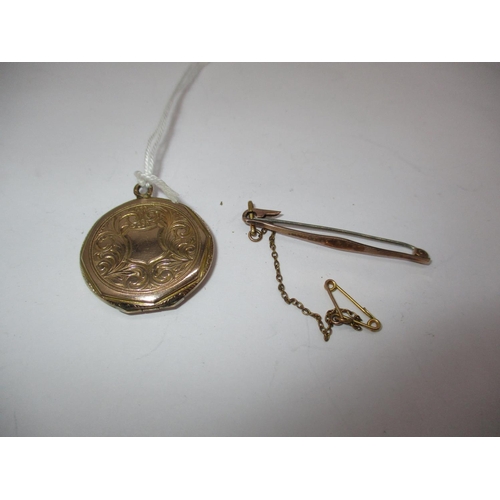 393 - 9ct Gold Brooch and a Locket