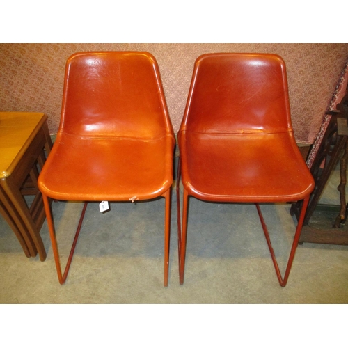 600 - Pair of Leather Covered Chairs