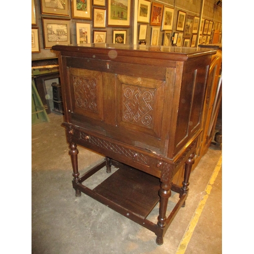 679 - Early 20th Century Escritoire Cabinet having Celtic Carved Decoration, 94cm