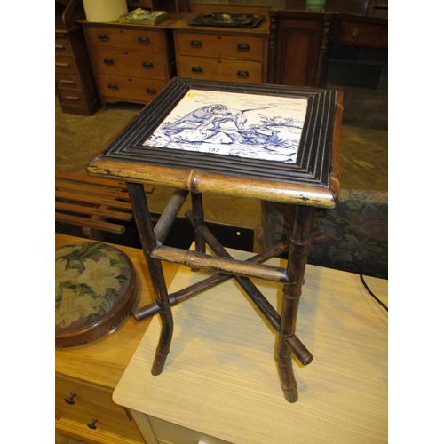 153 - Victorian Bamboo Plant Stand having a Tiled Top Depicting a Gun, Dog and Game