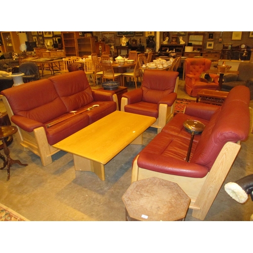 Burgundy Leather and Light Oak Pair of Settees and Easy Chair