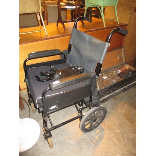 704 - Lomax Pluss Wheel Chair