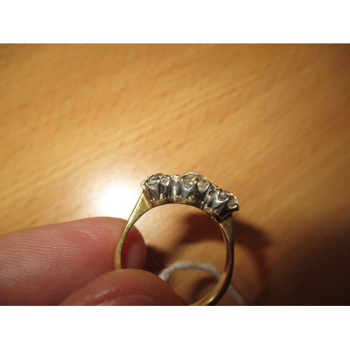 392 - Three Stone Diamond Ring, the stones of approx 6mm and 5mm