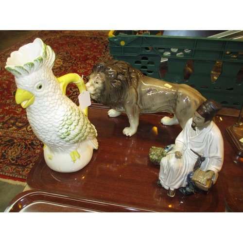 287 - Pottery Lion, Parrot Jug and Chinese Figure