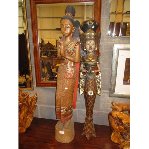 354 - Two Eastern Carved Wood Figures, 100 and 102cm