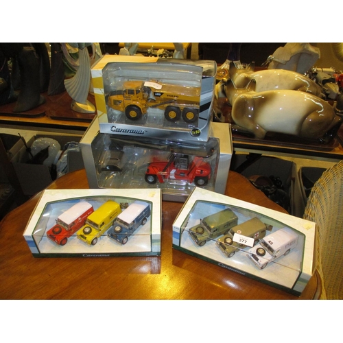 377 - Two Cararama Land Rover Sets and 2 Others