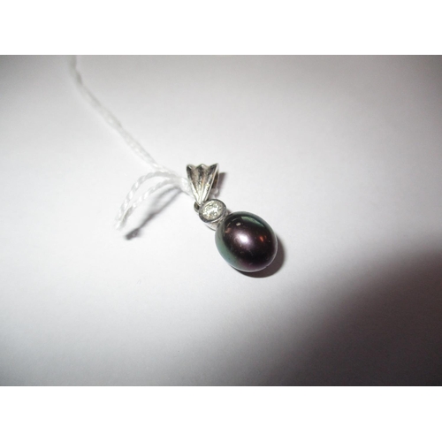 496A - 9ct White Gold Diamond and Black Pearl Pendant