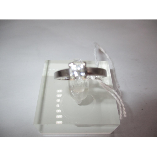 638 - 18ct White Gold Ring Set with Four Small Square Shaped Diamonds, 3.3g, Size O