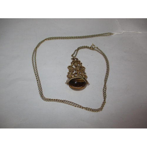 640 - 9ct Gold Mounted Tigers Eye Swivel Fob with a 6g Chain, 20.5g total