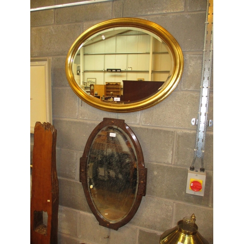 661 - Two Oval Framed Wall Mirrors