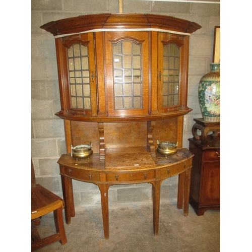 780 - Early 20th Century Oak Bowfront Cabinet having Leaded Glass Doors above a Writing Slope ad Drawers, ... 