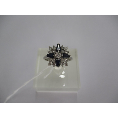 435 - 18ct White Gold Sapphire and Diamond Cluster Ring