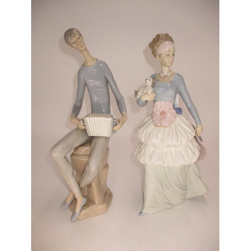 480 - Two Nao Figures Woman with Puppy and Man with Concertina