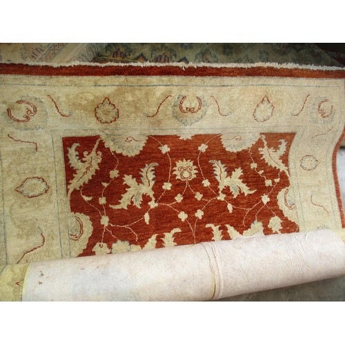 648 - Three Traditional Pattern Rugs