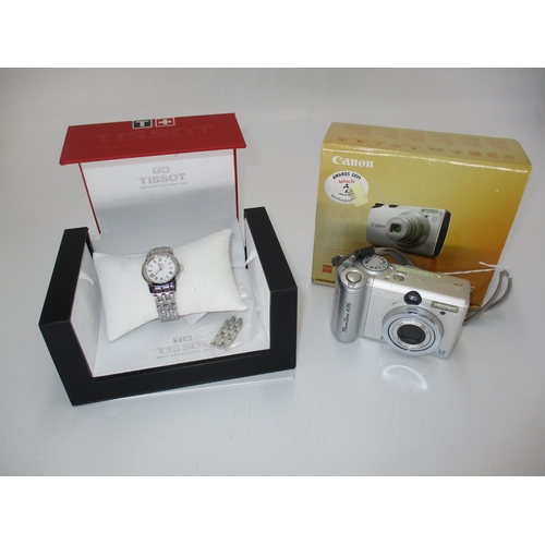 251 - Ladies Tissot 1853 Watch with Box and Papers, along with a Canon A95 Camera