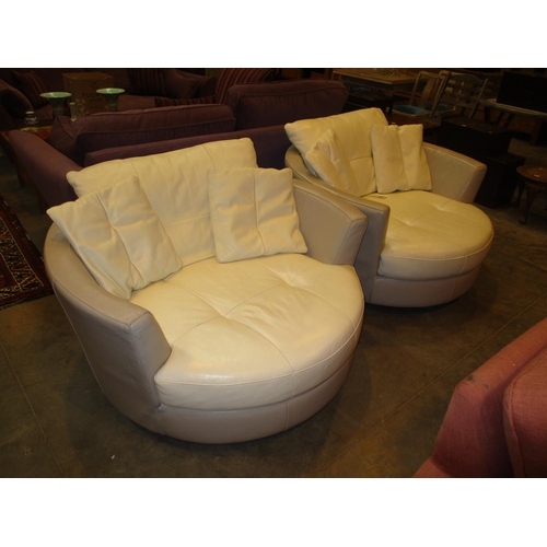 518 - Pair of Leather Revolving Lounge Chairs