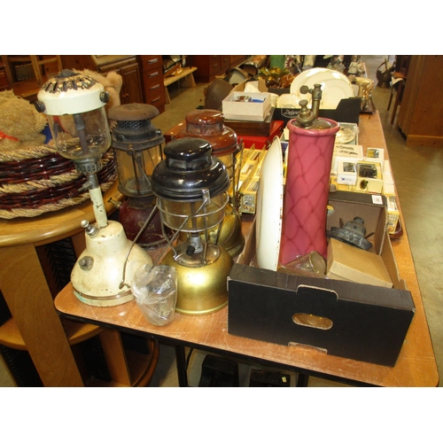 202 - Four Storm Lamps, Lamp Parts etc