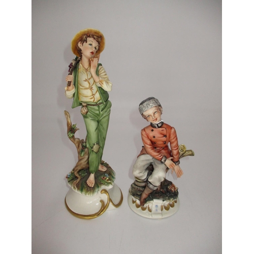 266 - Two Capodimonte Figures of Boys, 17 and 27cm