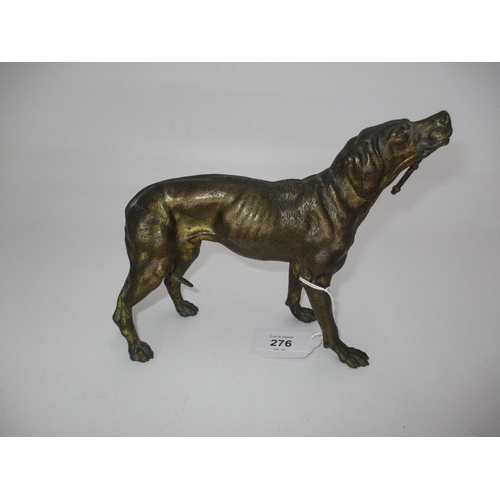 276 - Patinated Bronze Figure of a Gun Dog Holding a Riding Whip, 19cm long, 17cm high