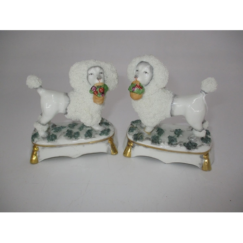 281 - Pair of Victorian Porcelain Figures of Poodles Holding Baskets of Flowers, 10.5cm high