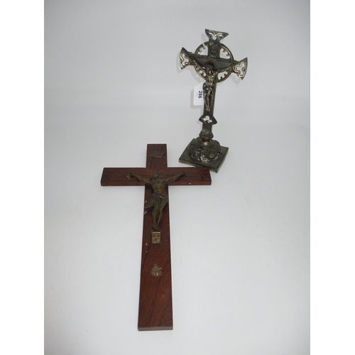 286 - Rosewood and Patinated Metal Crucifix, along with a Silvered Metal Crucifix