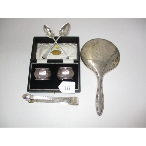 334 - Group of Silver Items : Cased Pair of Napkin Rings, Hand Mirror, Pair of Bright Cut Sugar Tongs and ... 