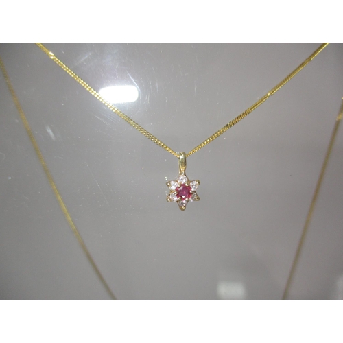 467 - 585 Gold Necklace with a Ruby and Diamond Set Pendant, 2.2g total