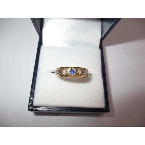 531 - Gold Sapphire and Diamond Ring