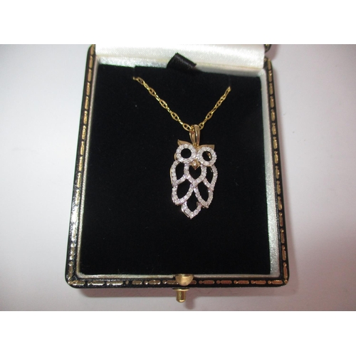 536 - 9ct Gold Diamond Owl Pendant with 10ct Gold Chain