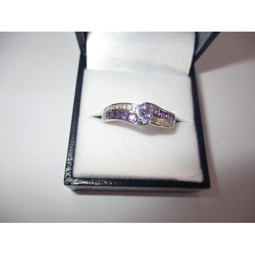 539 - Tanzanite, Amethyst and White Topaz Ring