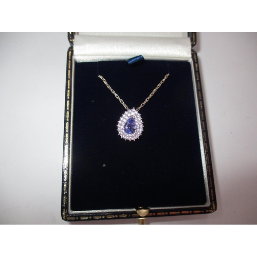 540 - Tanzanite and White Topaz Pendant with Chain