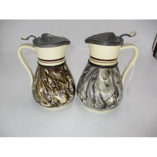 579 - Pair of MacIntyre Pottery Pewter Lidded Jugs