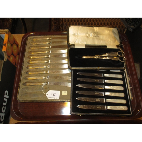 134 - Cased Set of 10 Silver Handle Tea Knives, Cased Grape Scissors and a Case of 6 Mother of Pearl Handl... 