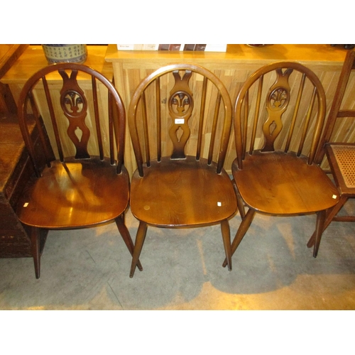 661 - Three Ercol Dining Chairs