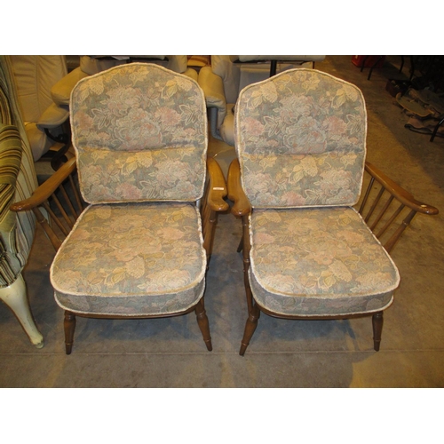 691 - Pair of Ercol Wheel Back Lounge Chairs