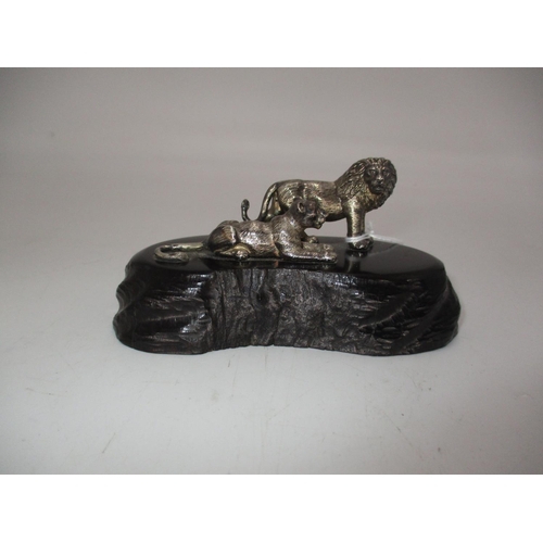 607 - Patrick Mavros, Zimbabwe, Silver Group of Lions on a Wooden Base, 18cm