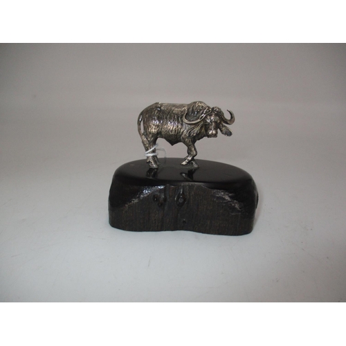 609 - Patrick Mavros, Zimbabwe, Silver Water Buffalo on a Wooden Base, 8cm