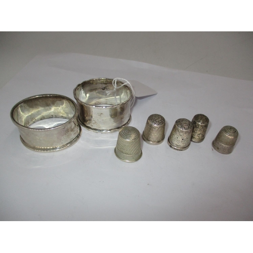 790 - Two Silver Napkin Rings, 4 Silver Thimbles and Another