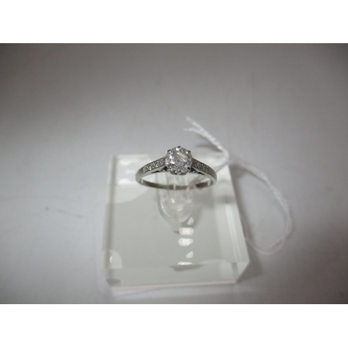 303 - 18ct Gold and Platinum Diamond Solitaire Ring Having Diamond Set Shoulders, Size L, 1.9g